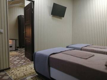 Фото номера 2-комнатный номер полулюкс с 2 односпальными кроватями Гостевой дом Европейский г. Тула 3