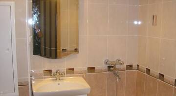 Фото номера Трехместный номер Гостиница Apartments at Lozhevaya Ulitsa г. Тула 7