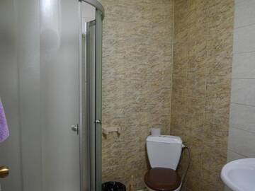Фото номера Двухместный номер с 1 двуспальной кроватью и дополнительной кроватью Гостевой дом Kompleks Parus г. Тула 3